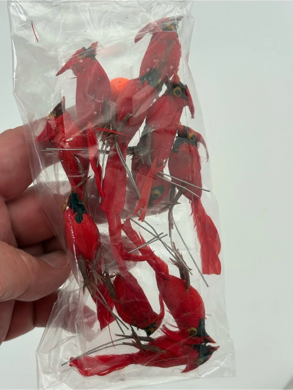 11 Crafting Redbirds with Feathers and Metal Twist Connectors